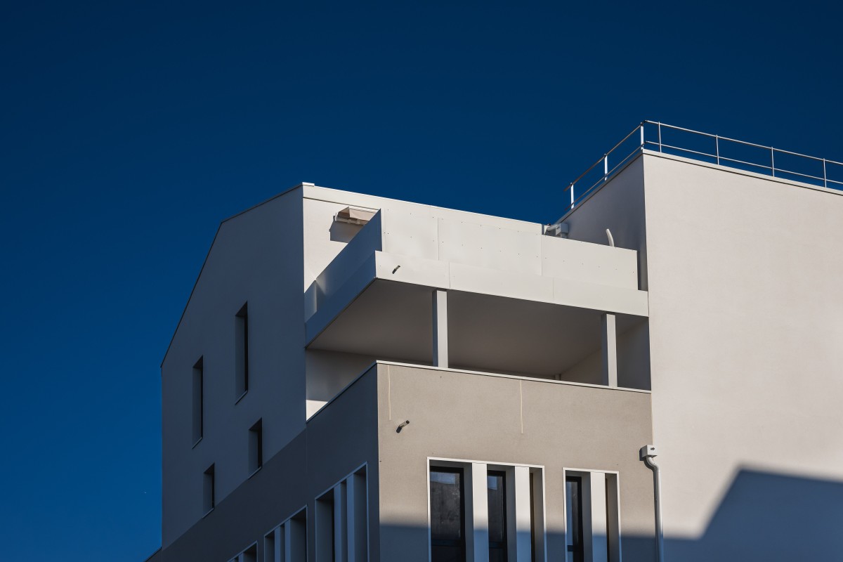 Construction immeuble de logements, bureaux et commerces par ARCHI CONSEIL Architecture LES TERRRASSES DU BOULEVARD